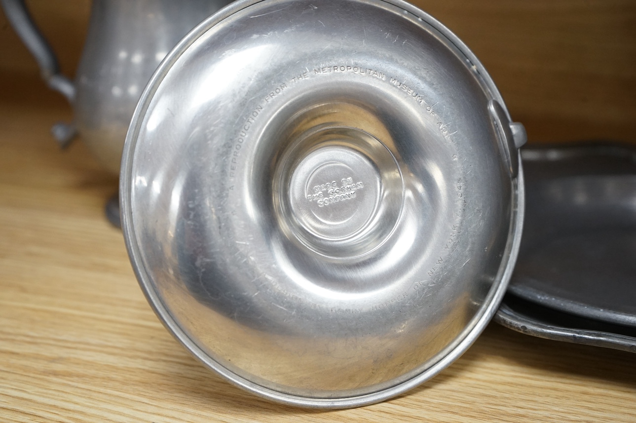 A group of pewter including an 18th century pewter plate dated 1737 on base. 23cm diameter, together with a Calibri silver mounted lighter, London, 1962. Condition - fair to good